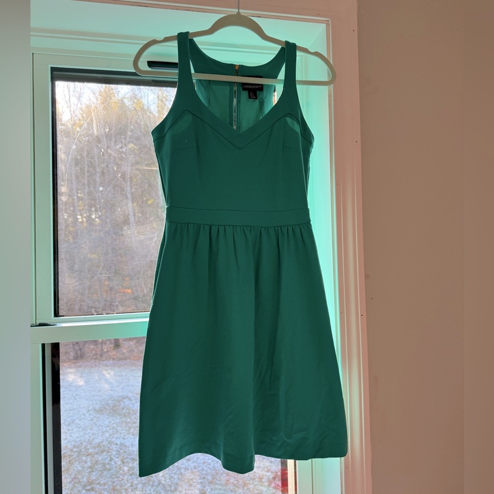 Teal Cynthia Rowley dress with pockets.
